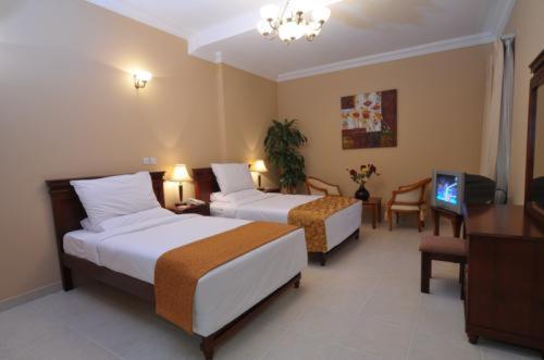 Le Grand Hotel Doha Ruang foto